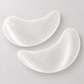 Zwei FRAUSCHMITZ Hydro Eye Pads aus hauchdünnem SecondSkin-Vlies – feine Textur in Nahaufnahme